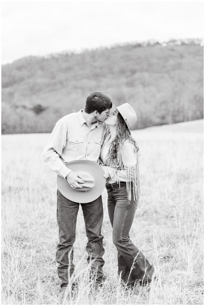 cowboy and cowgirl kissing