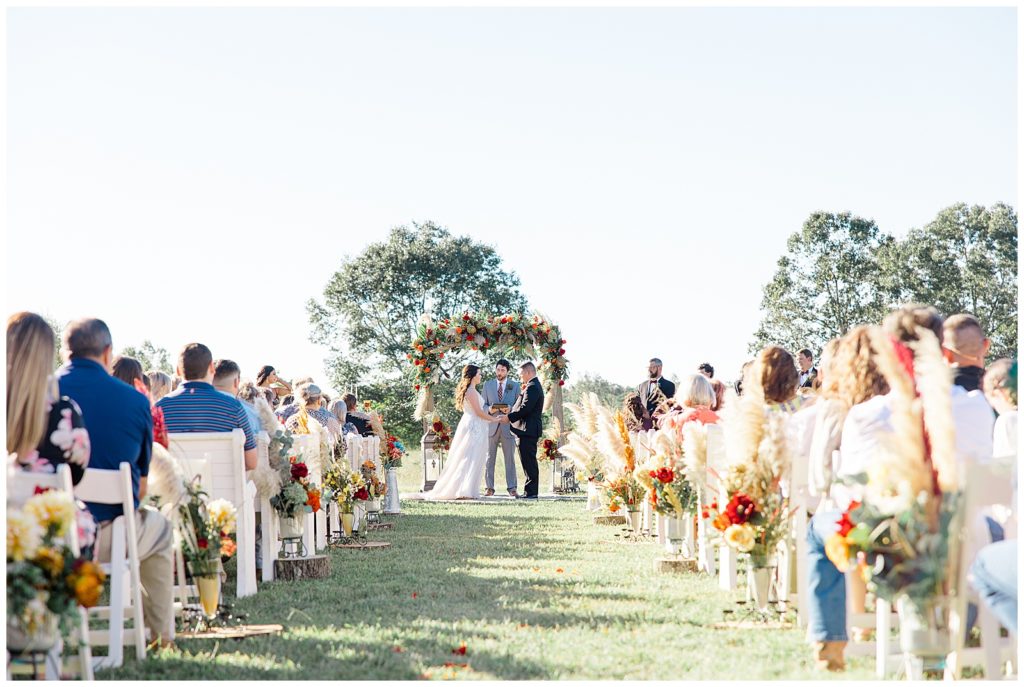 wedding ceremony at steel magnolia farms