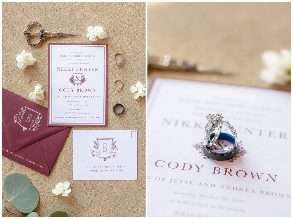 wedding flat lay with invitations and rings