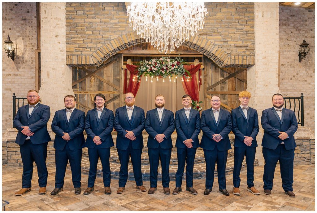 groomsmen portrait with navy blue suits